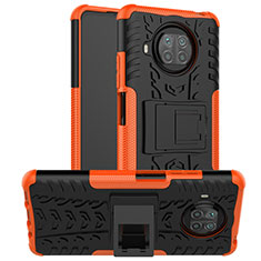Silikon Hülle Handyhülle und Kunststoff Schutzhülle Hartschalen Tasche mit Ständer JX1 für Xiaomi Mi 10T Lite 5G Orange