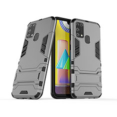 Silikon Hülle Handyhülle und Kunststoff Schutzhülle Hartschalen Tasche mit Ständer KC3 für Samsung Galaxy M21s Grau